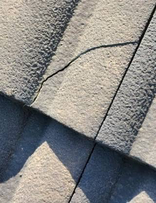 a cracked roof tile